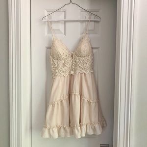 A cream colored flowy dress (worn once)